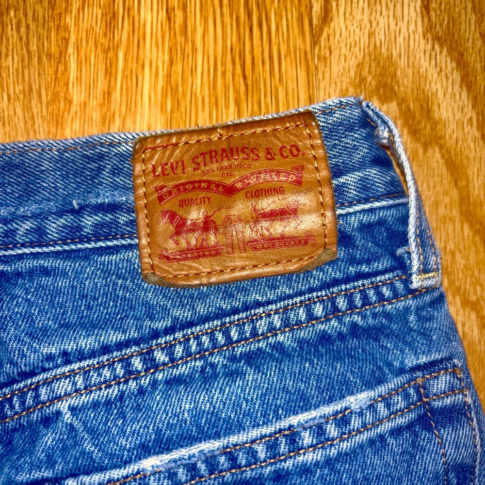 Distressed Levi’s Blue Jeans